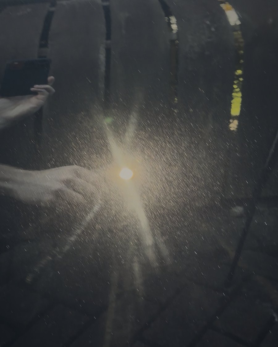 Paintwork before polishing: swirl marks radiating around the light