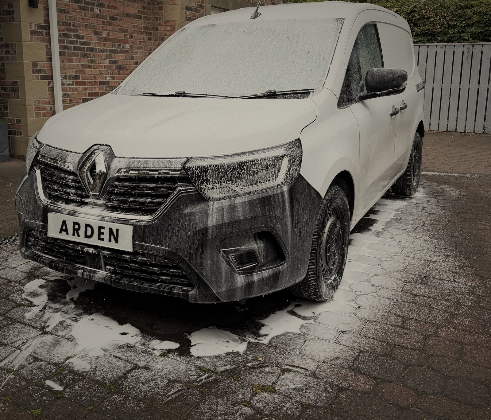 Company van being snow foamed on site by ARDEN Detailing